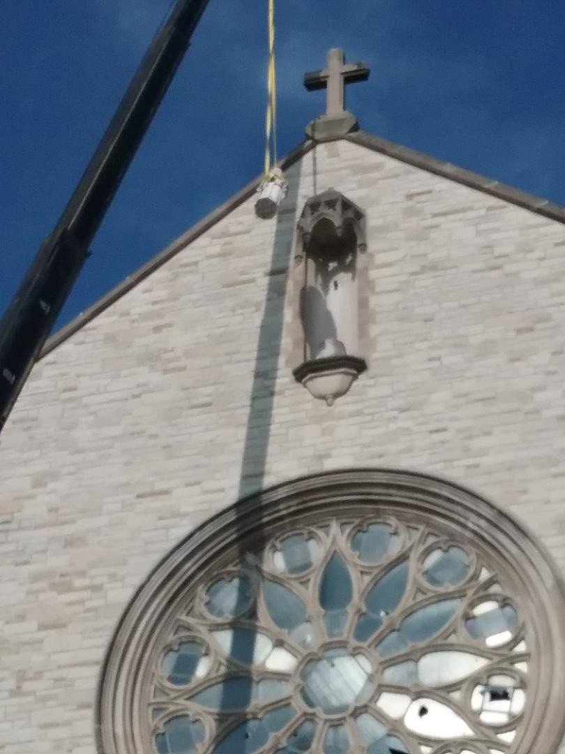 Crane and lift equipment working on a church